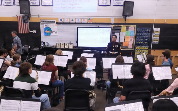 Musician Technical Assistant visits HB Plant High School for a band talk