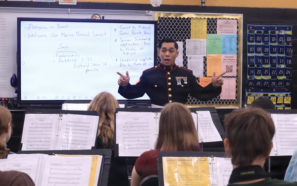 Musician Technical Assistant visits HB Plant High School for a band talk