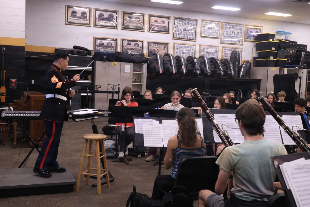 Musician Technical Assistant visits HB Plant High School for a band talk