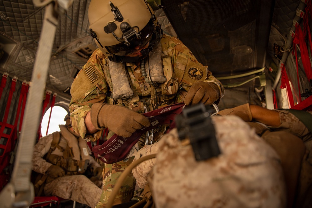 U.S. Army Soldiers and U.S. Marines assigned to Joint Task Force-Southern Guard participate in CASEVAC exercise