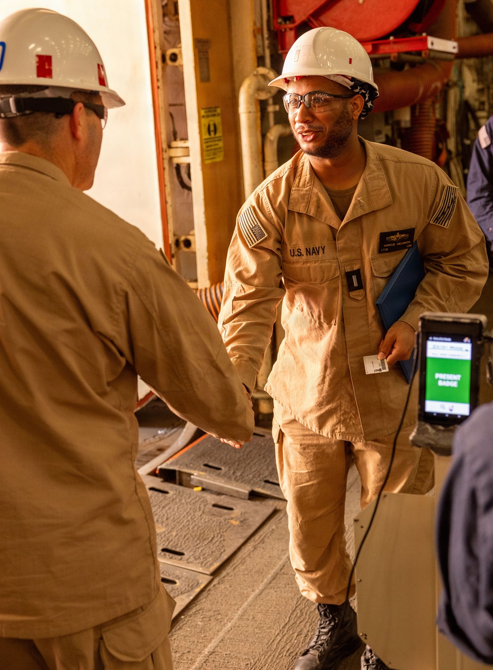 Piping Ashore for Lt. jg. Marcus Melancon