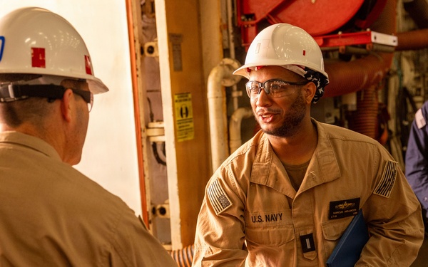 Piping Ashore for Lt. jg. Marcus Melancon