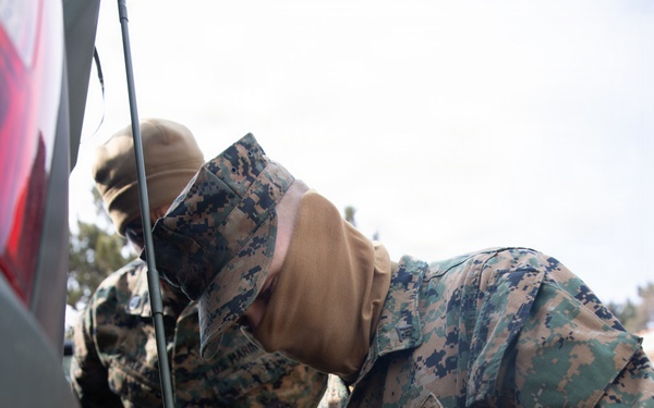 5th Air Naval Gunfire Liaison Company Marines conduct pre-mission gear inspections and establish communications during Freedom Shield 26