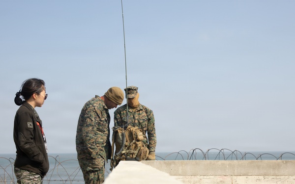 5th Air Naval Gunfire Liaison Company Marines conduct pre-mission gear inspections and establish communications during Freedom Shield 26