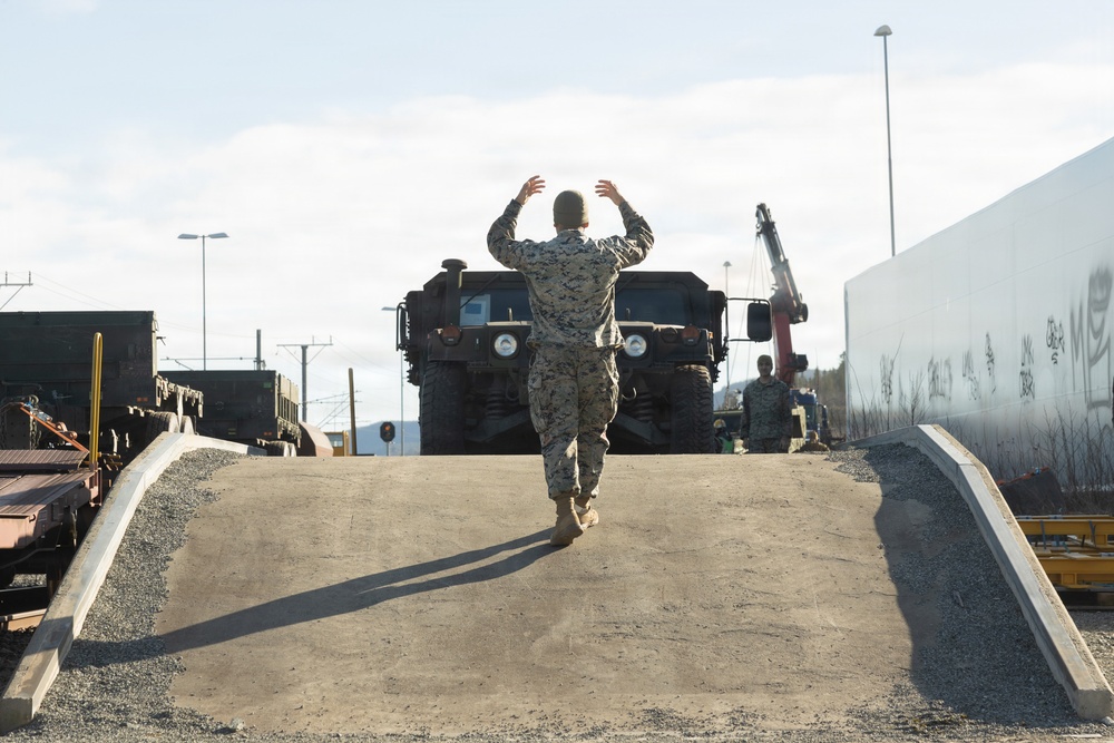 CORE26 | U.S. Marines Offload Ground and Logistical Equipment from a Train after Arctic Exercise