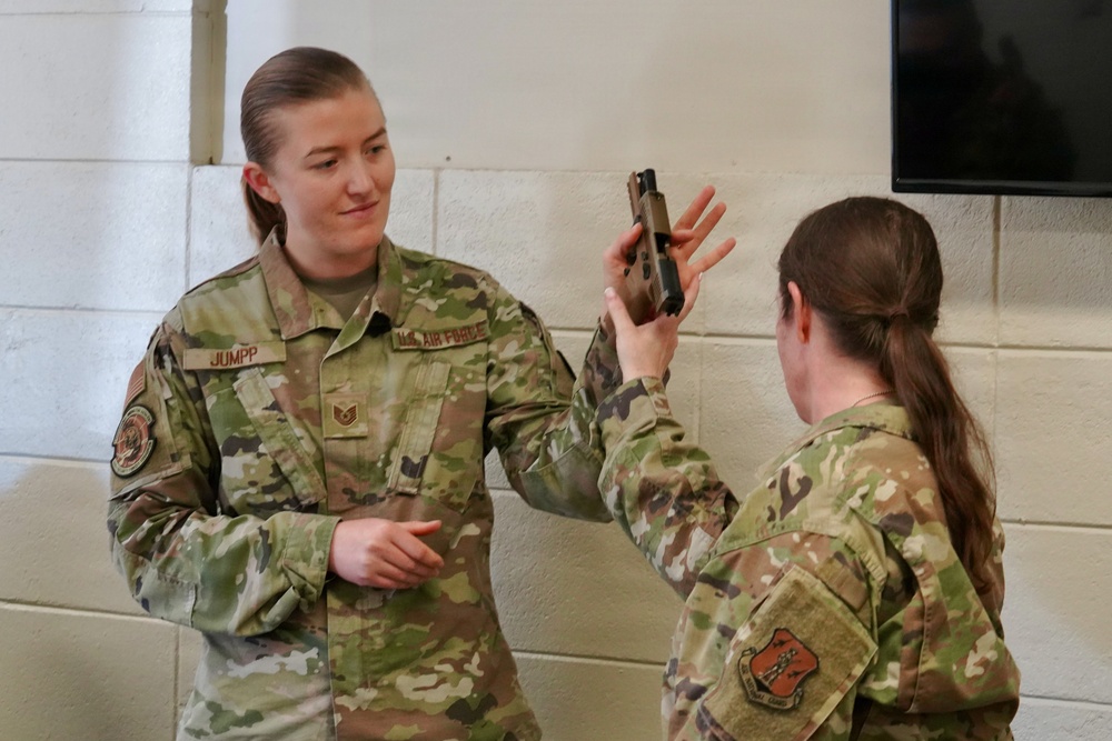 146 SFS CADM trains 146 AES on weapons qualifications