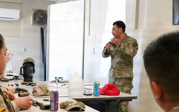 146 SFS CADM trains 146 AES on weapons qualifications