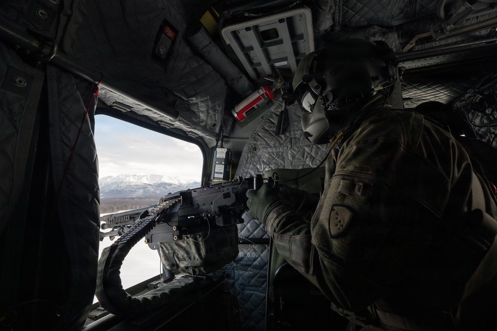 AKARNG Chinook aviators conduct aerial gunnery training