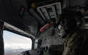 AKARNG Chinook aviators conduct aerial gunnery training
