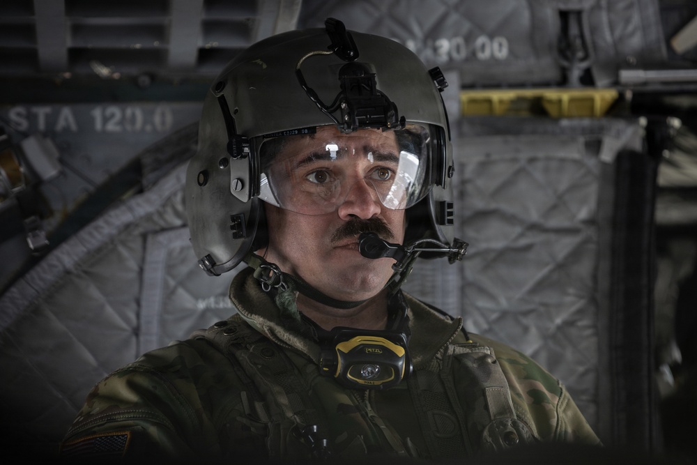 AKARNG Chinook aviators conduct aerial gunnery training