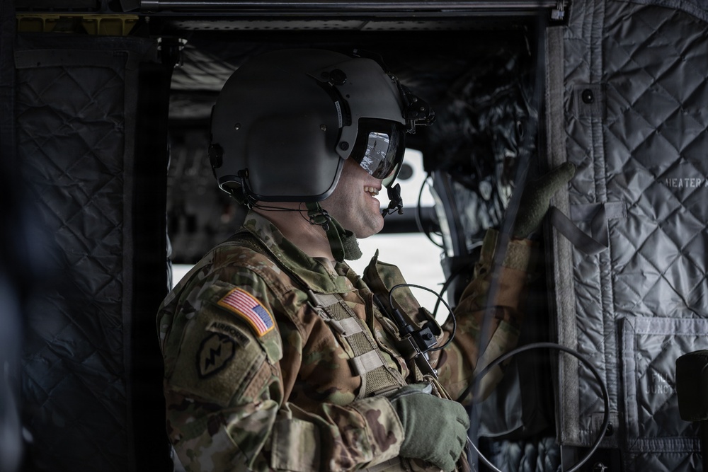 AKARNG Chinook aviators conduct aerial gunnery training