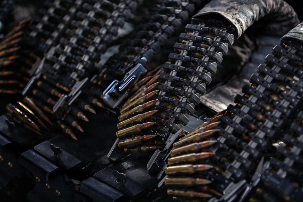 AKARNG Chinook aviators conduct aerial gunnery training