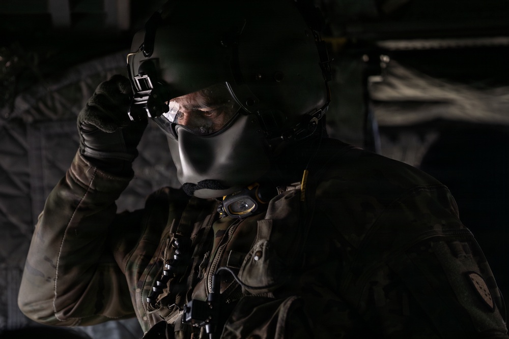 AKARNG Chinook aviators conduct aerial gunnery training