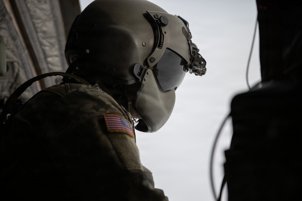 AKARNG Chinook aviators conduct aerial gunnery training