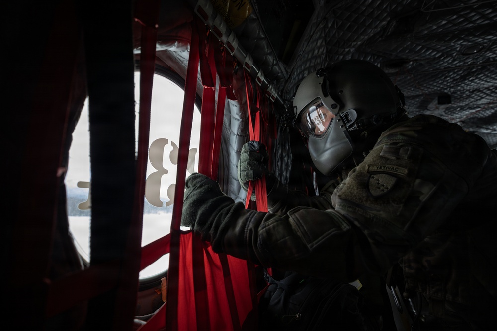 AKARNG Chinook aviators conduct aerial gunnery training