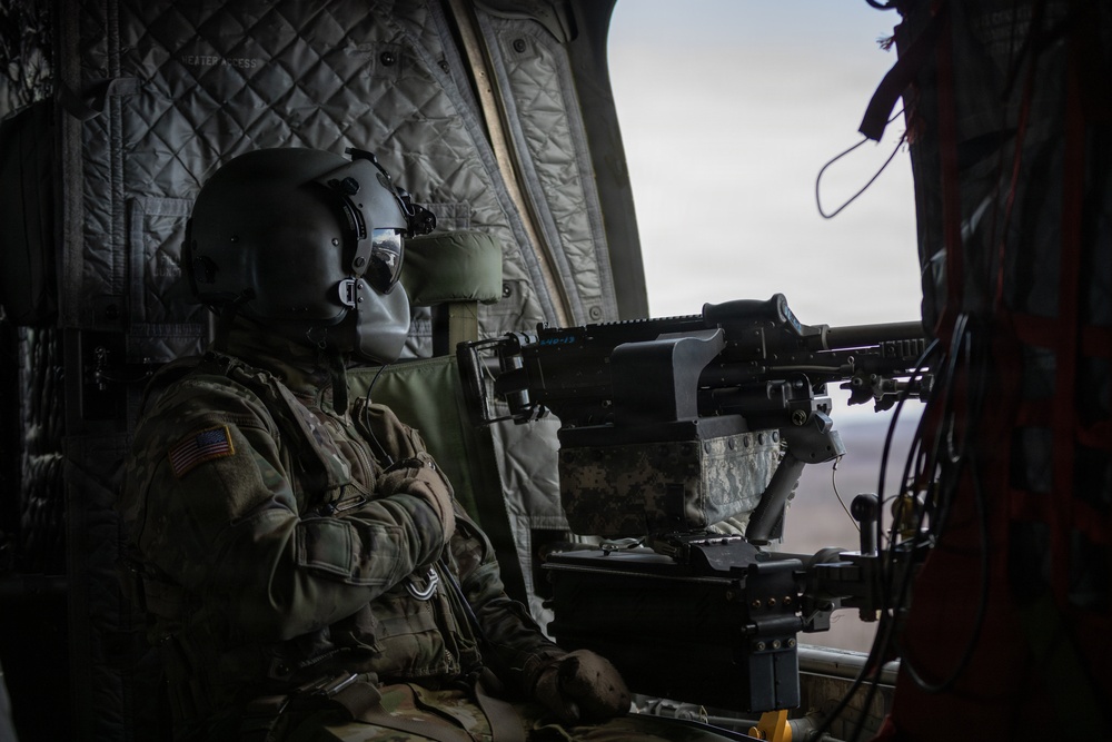 AKARNG Chinook aviators conduct aerial gunnery training