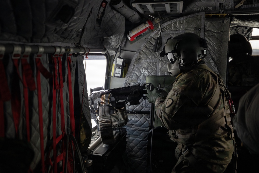 AKARNG Chinook aviators conduct aerial gunnery training