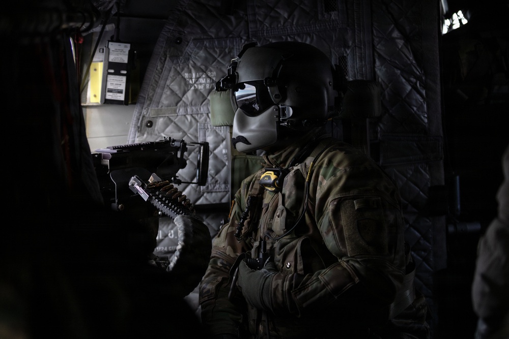 AKARNG Chinook aviators conduct aerial gunnery training