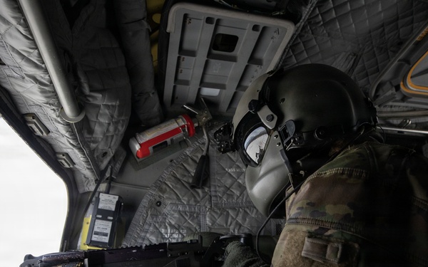 AKARNG Chinook aviators conduct aerial gunnery training