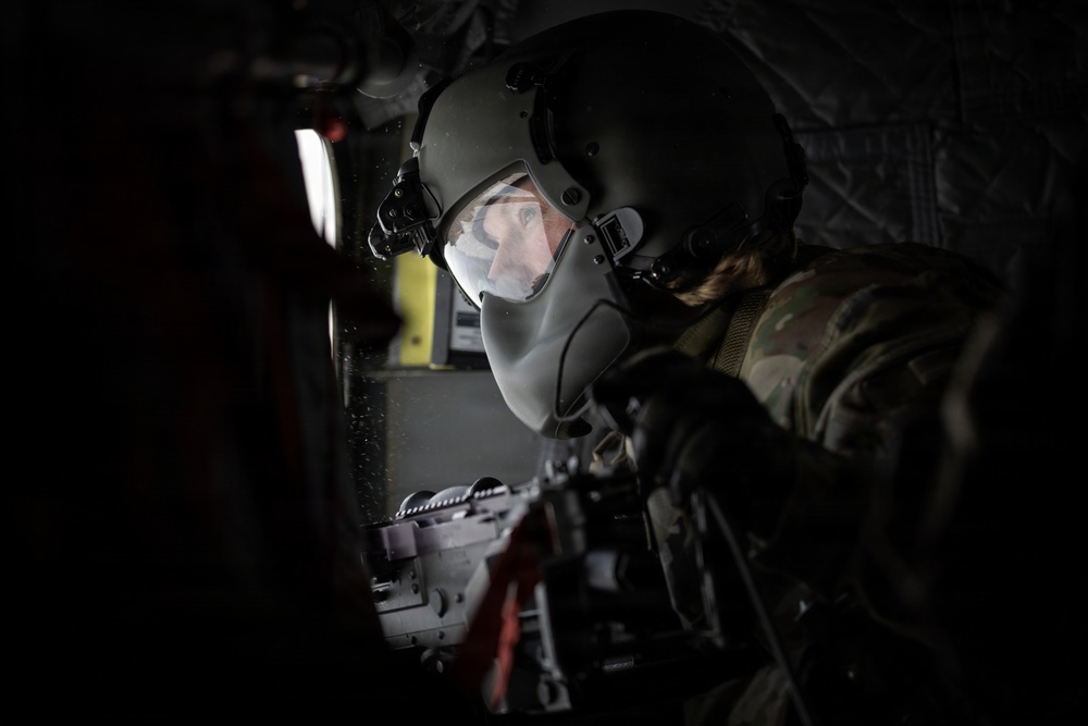 AKARNG Chinook aviators conduct aerial gunnery training