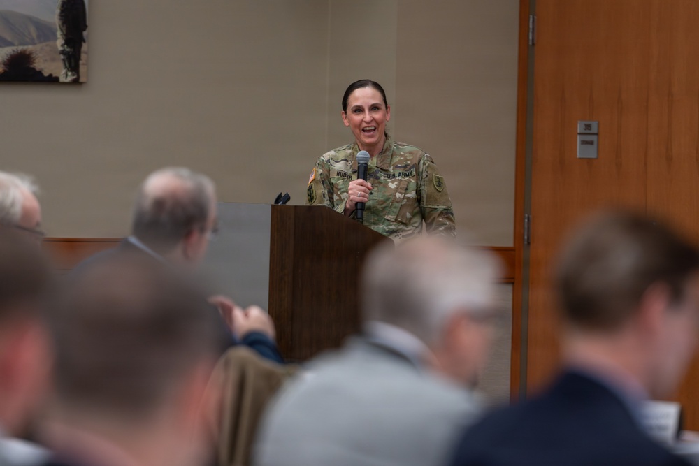 Brig. Gen. Jackie Huber delivers opening remarks at 2026 PLA Conference