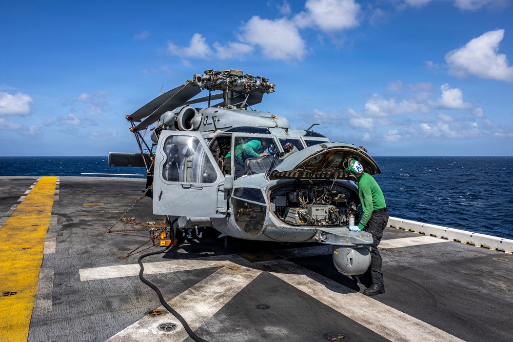 USS Iwo Jima Sailors Conduct MH-60S Sea Hawk Maintenance