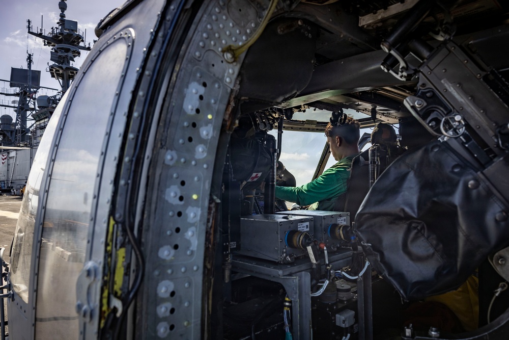USS Iwo Jima Sailors Conduct MH-60S Sea Hawk Maintenance