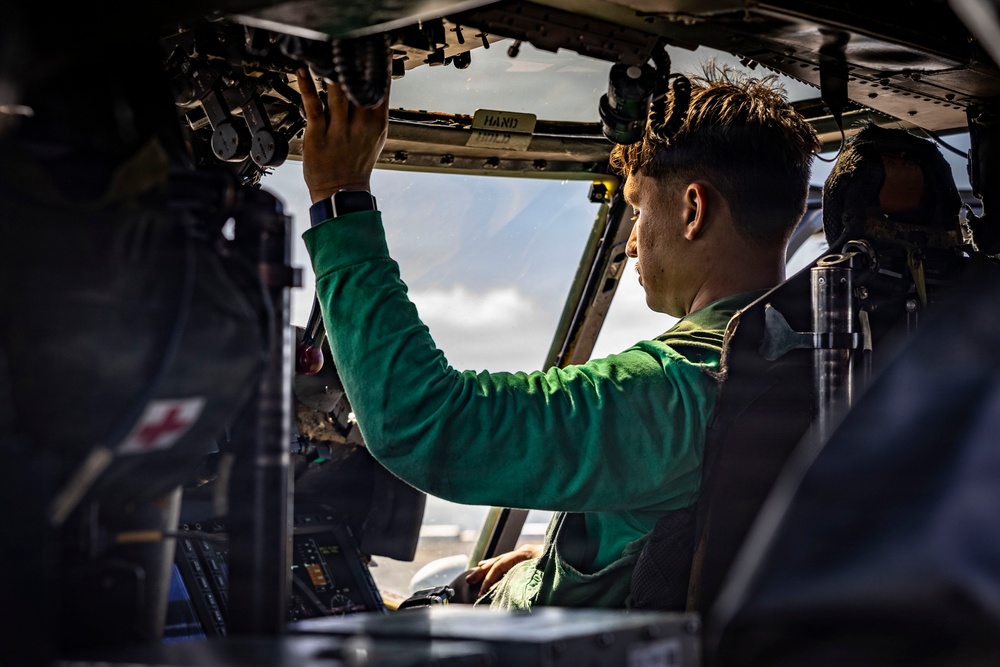 USS Iwo Jima Sailors Conduct MH-60S Sea Hawk Maintenance