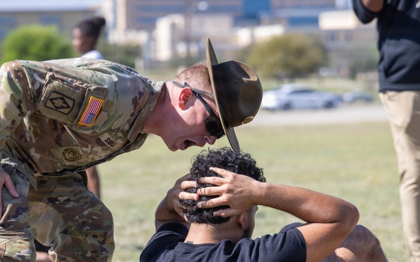 Students, coaches experience Army discipline, teamwork during U.S. Army Experience at Fort Hood