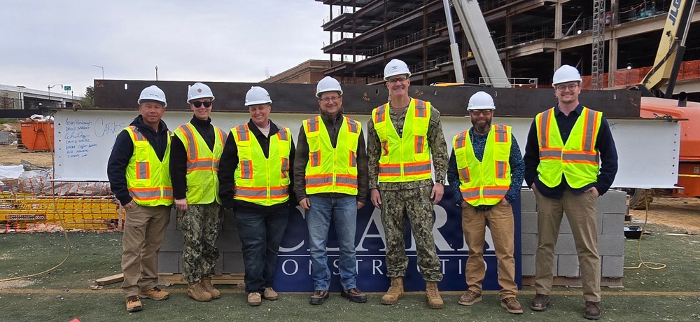 NAVFAC Washington Marks Topping Out Milestone for New Marine Barracks