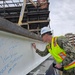 NAVFAC Washington Marks Topping Out Milestone for New Marine Barracks