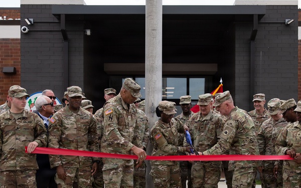 Preparing to cut ribbon