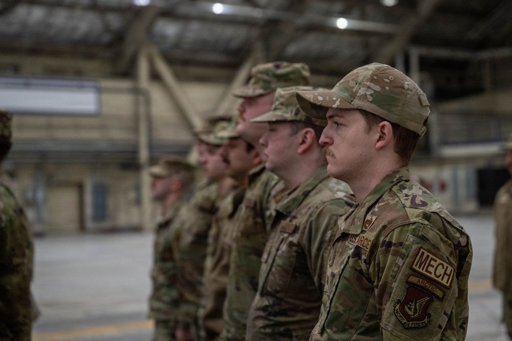 The door to the 90th and 525th FGS closes as the 3d AMXS opens