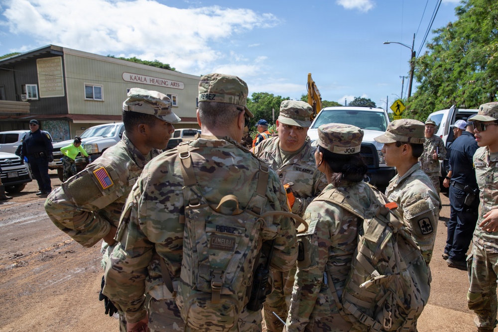 Hawaii National Guard assists Waialua residents with debris removal, water distribution