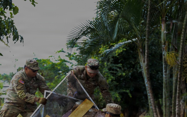 Hawaii National Guard assists Waialua residents with debris removal, water distribution