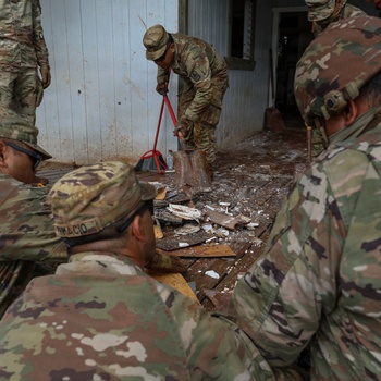 Hawaii National Guard assists Waialua residents with debris removal, water distribution