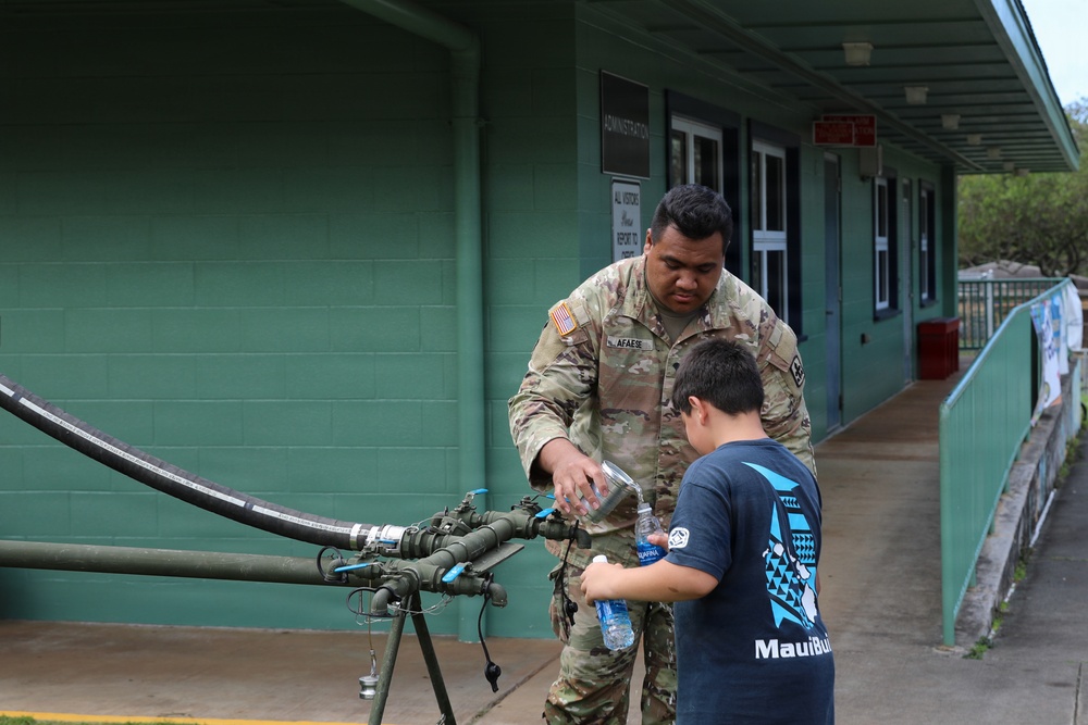 Hawaii National Guard assists Waialua residents with debris removal, water distribution