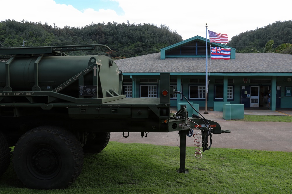 Hawaii National Guard assists Waialua residents with debris removal, water distribution