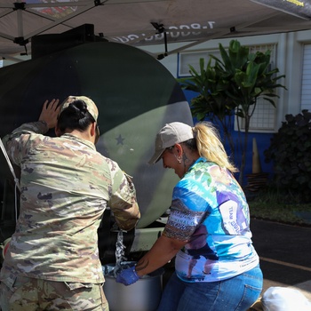 Hawaii National Guard assists Waialua residents with debris removal, water distribution