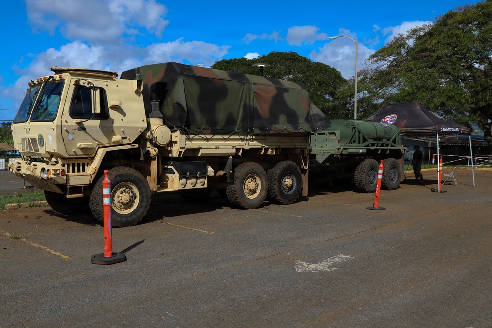 Hawaii National Guard assists Waialua residents with debris removal, water distribution