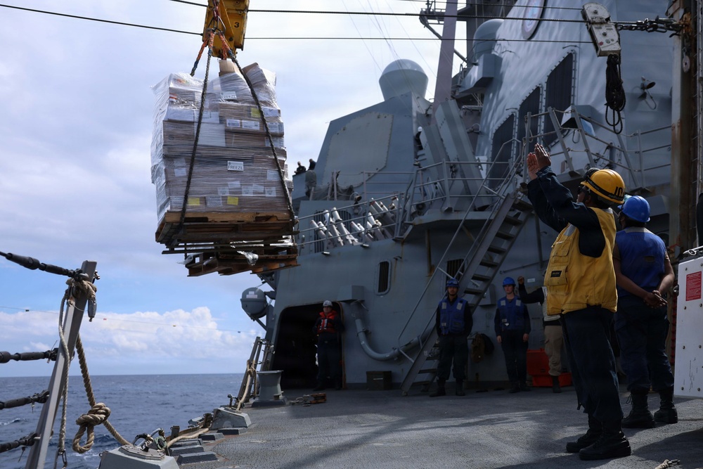 USS Thomas Hudner (DDG 116) Conducts a Replenishment-at-Sea