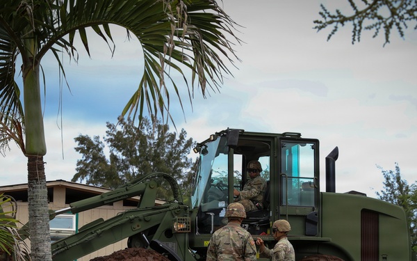 Hawaii National Guard assists Waialua residents with flood debris removal