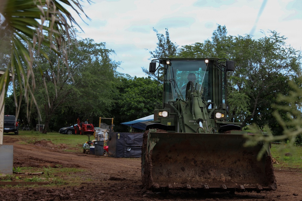 Hawaii National Guard assists Waialua residents with flood debris removal