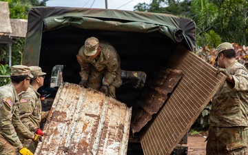 Hawaii National Guard assists Waialua residents with flood debris removal