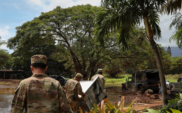 Hawaii National Guard assists Waialua residents with flood debris removal