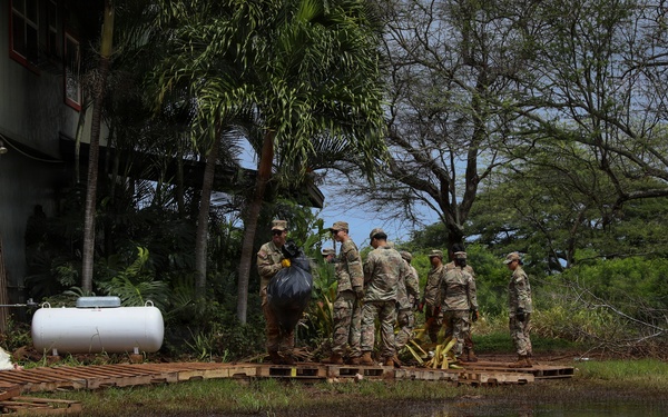Hawaii National Guard assists Waialua residents with flood debris removal