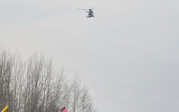 Lithuanian SAR helicopter fly over Runway Run 26