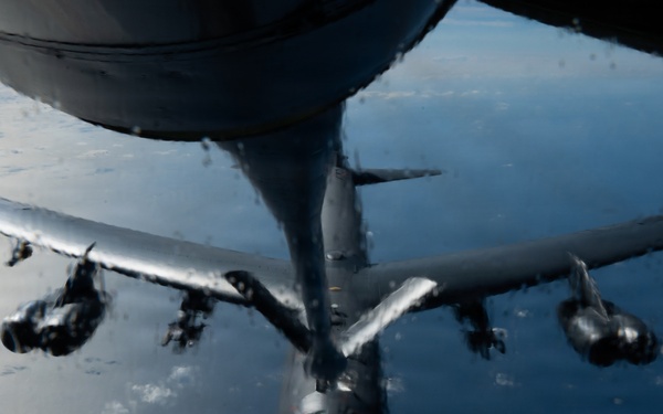 A KC-135 Stratotanker refuels B-52H Stratofortress during Operation Epic Fury