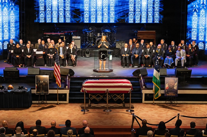 New York Governor, New York City Mayor, honor New York Army Guard Major Sorffly Davius during Brooklyn funeral.
