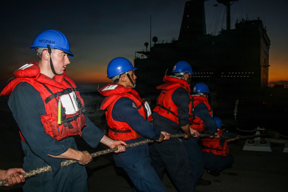 USS Frank E. Petersen Jr. (DDG 121) Conducts a Replenishment-at-Sea During Operation Epic